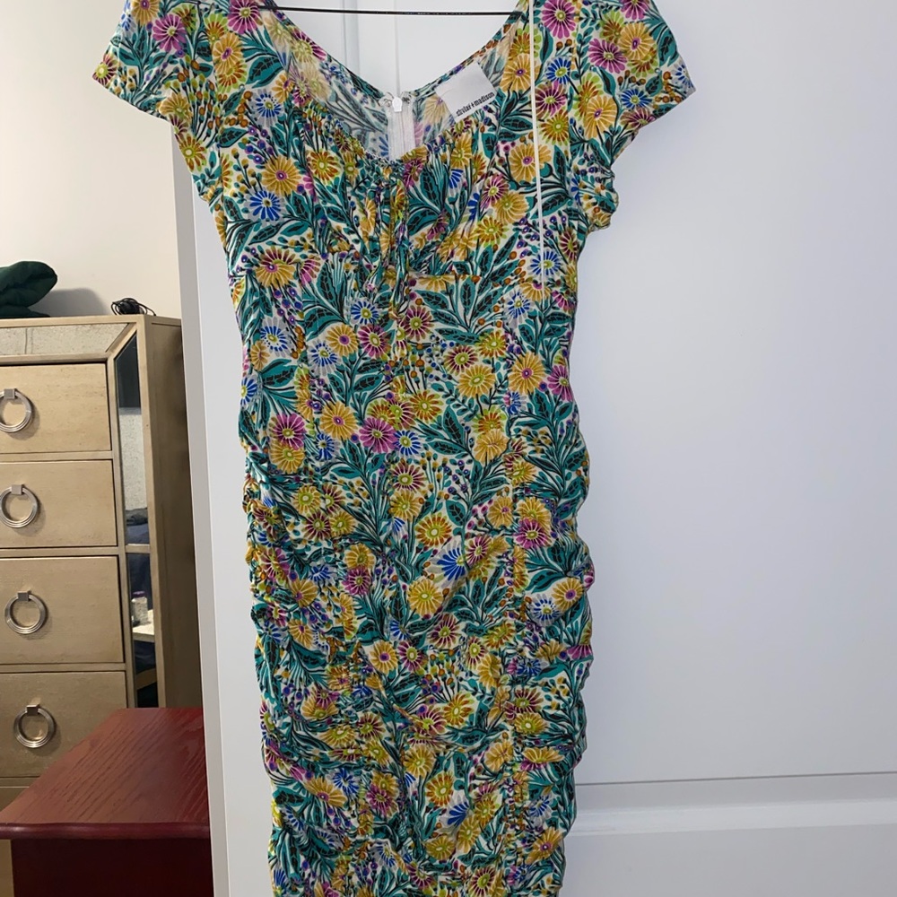 This is a dress from the cutest boutique, Ruby and Jenna! Fits like XS.